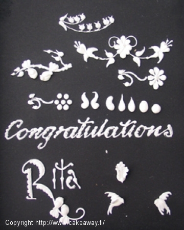 A glimpse into the artistry of the late Eddy Spence – royal icing samples from a day of learning and inspiration.